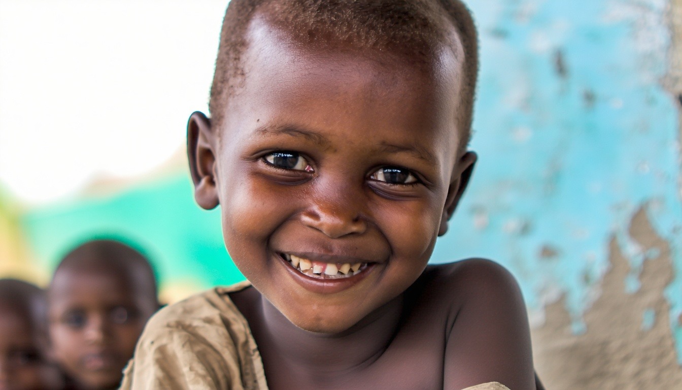 An orphan smiling at the camera