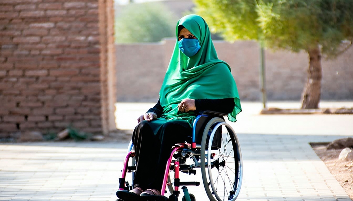 person in a Pakistan in a wheelchair
